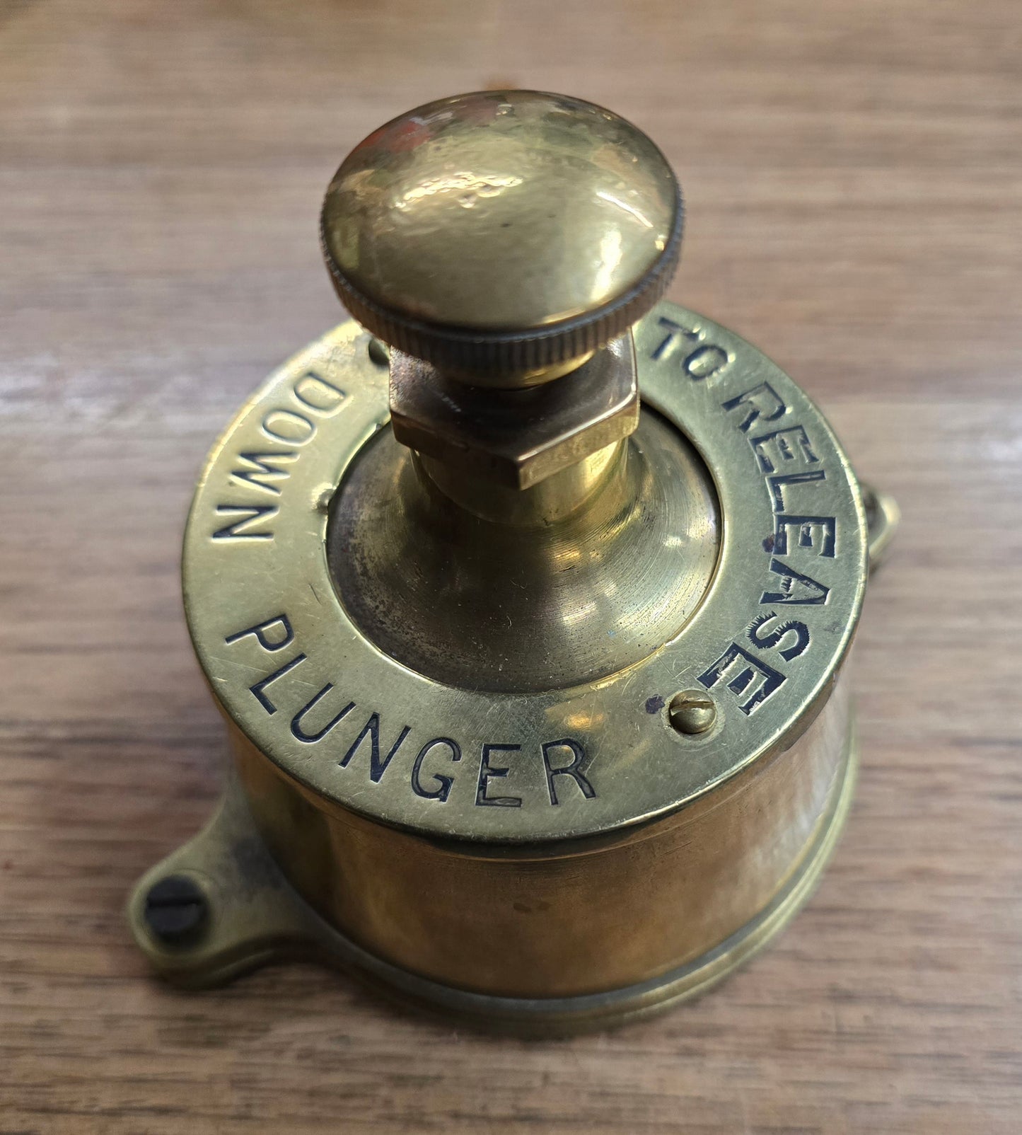 RA 7824 SYKES BRASS PLUNGER "PUSH TO RELEASE"