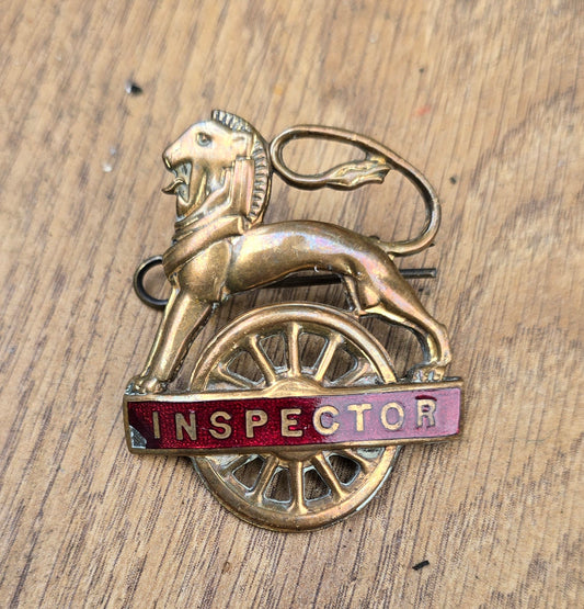 RA 7826  BRITISH RAILWAYS MIDLAND REGIN LION OVER WHEEL INSPECTORS BADGE