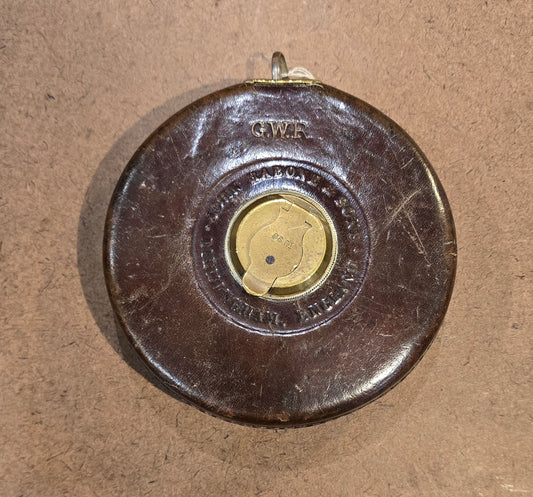 RA 7779  G.W.R. RABONE & SON, BIRMINGHAM 65 FOOT LEATHER CASE TAPE MEASURE.